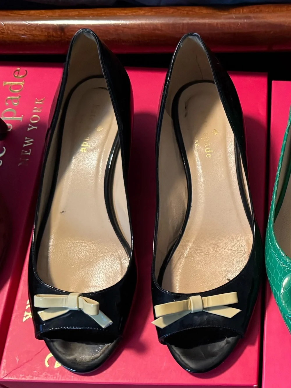 kate spade Black Patent Leather Wedge Pumps with Cream Bow